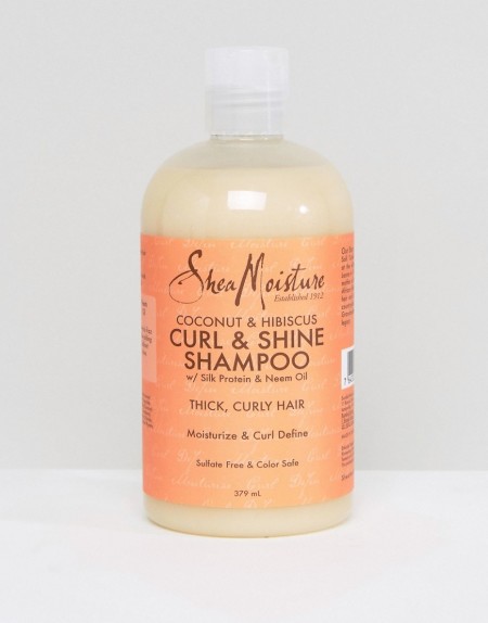 Shea Moisture - Die Locken verbesserndes und Glanz verleihendes Shampoo mit Kokosnuss und Hibiskus - Transparent